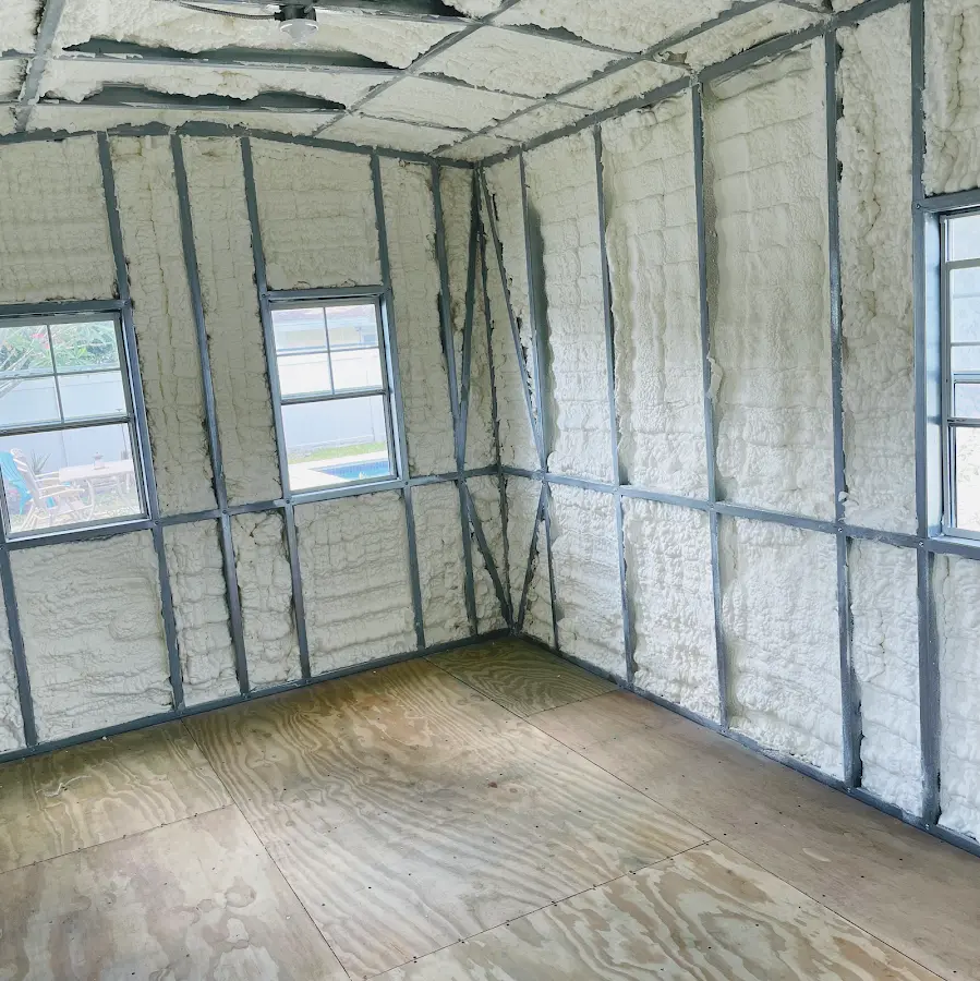 Closed-cell spray foam insulation applied to wall cavities in a residential project in Kings Mountain